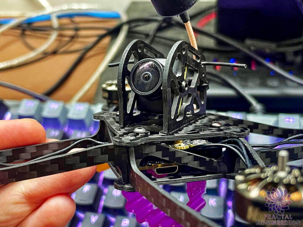 The arms can be assembled to clear the left or right side or the USB